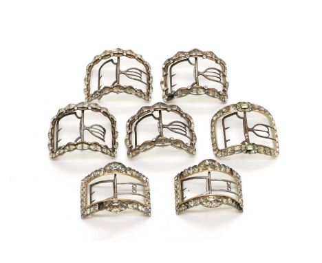 A collection of shoe buckles late 18th to early 19th century, comprising three pairs, and a single example, all with cut past