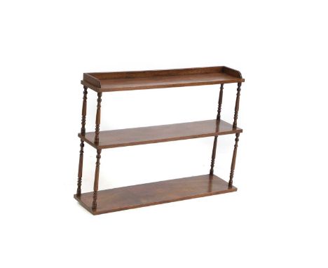 A Regency mahogany wall shelf with turned columns and three open shelves,89cm wide18cm deep69cm high