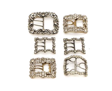 A collection of shoe buckles late 18th to early 19th century, comprising two pairs and two singles, of rectangular form, with