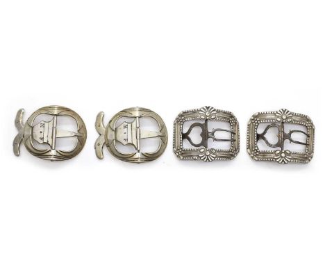 Two pairs of silver shoe buckles comprising;an oval pair,mid to late 18th century, possibly French, the tongue marked 'M.F', 