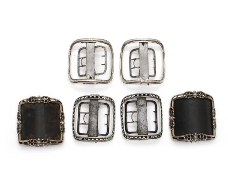 Three pairs of Eley type silver shoe buckles comprising;a pair by William Eley,London 1792, with a beaded border, the pin sta