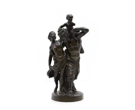 A bronze figure group in the style of Claude Michel Clodion, a bacchanal depiction of a satyr, putti and nymph with tambourin