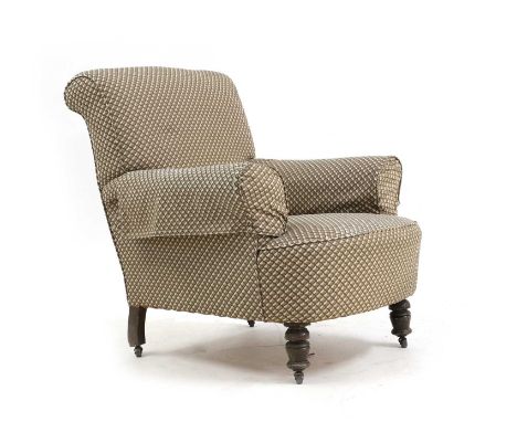 An Edwardian easy armchair  with loose covers 82cm wide 93cm deep 88cm high    Condition ReportWith tear to the top corner of