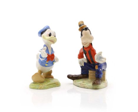 Two Beswick porcelain Walt Disney figures of 'Goofy' and 'Donald Duck', each with gold marks, 11 and 10cm high (2)Condition R