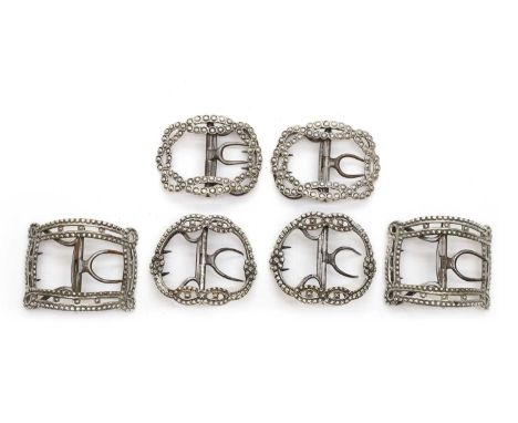 Three pairs of George III silver shoe buckles comprising;a pair by Thomas Farren,London c.1740, of rectangular form, with bri