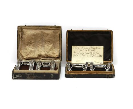 Two cased sets of shoe buckles late 18th to early 19th century, of rectangular form, inset with cut paste stones, 6 and 6.5cm