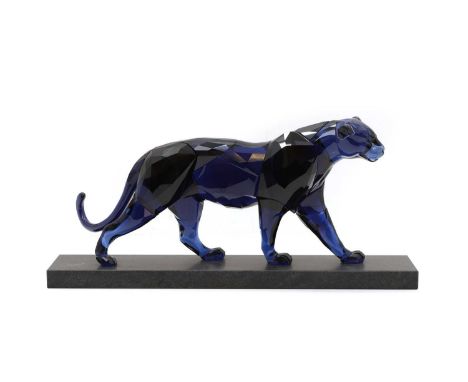 A Swarovski crystal glass leopard c.2018, designed by Martin Zendron, in navy blue crystal glass with enlarged facets, raised