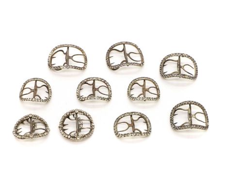 Five pairs of shoe buckles late 18th to early 19th century, of rounded form, inset with cut paste stones,6cm wide