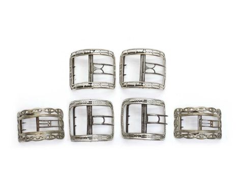 Three pairs of George III silver shoe buckles comprising;a pair by Charles Houghton,c.1785, of rectangular form, with pierced