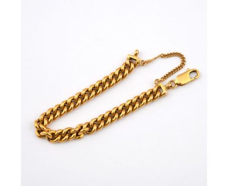 A 22CT GOLD CURB LINK BRACELET. 15cm long, 44.6 grams.  **BP 22.5% inc VAT + Lot Fee of £8  
