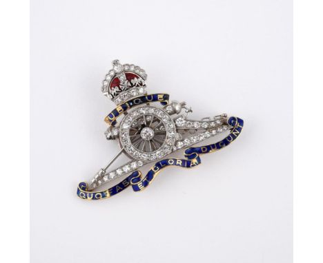 A DIAMOND AND ENAMEL REGIMENTAL BROOCH FOR THE ROYAL ARTILLERY. mounted with circular-cut diamonds, with blue and red enamel 