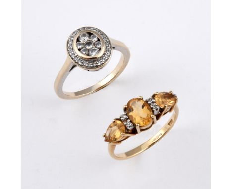 A DIAMOND CLUSTER RING. mounted  with round brilliant-cut diamonds in gold, size L, together with a citrine and diamond ring,