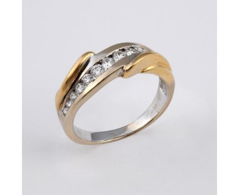 A DIAMOND HALF HOOP RING. mounted with thirteen circular-cut diamonds, in 18ct yellow gold. Size P.  **BP 22.5% inc VAT + Lot