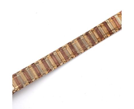 A 9CT THREE COLOUR GOLD BRACELET. formed with alternate panels of gold, with engine turned decoration, with concealed clasp, 