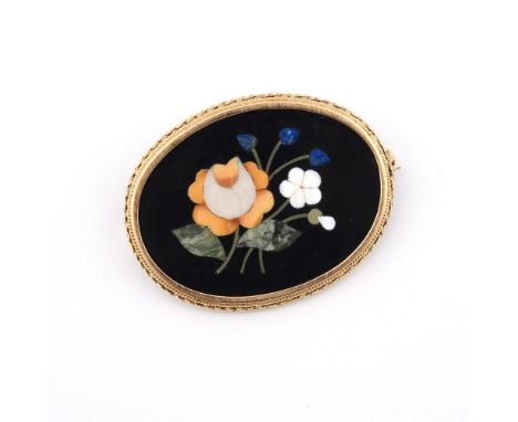 A PIETRA DURA BROOCH. of foliate form, mounted in an 18ct gold reeded frame, 4.5cm wide.  **BP 22.5% inc VAT + Lot Fee of £8 