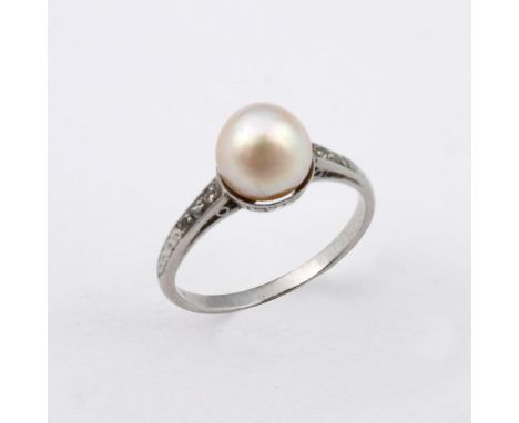 A DIAMOND &amp; PEARL RING. the untested pearl is set with three rose-cut diamonds to each shoulder. Size I.  **BP 22.5% inc 