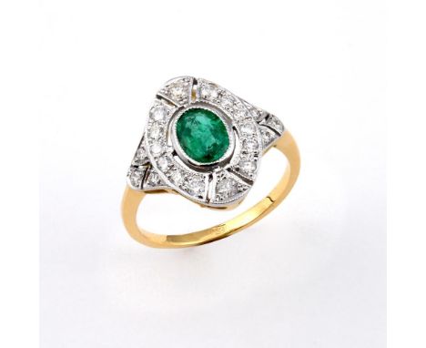 AN EMERALD AND DIAMOND CLUSTER RING. the oval-shaped emerald is set within a surround of circular-cut diamonds, with further 