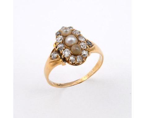 AN ANTIQUE DIAMOND AND PEARL CLUSTER RING. the three untested pearls are set within a surround of rose-cut diamonds in gold. 