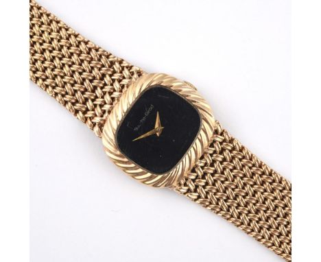 A LADY'S 9CT GOLD MECHANICAL WRISTWATCH BY BEUCHE-GIROD. with signed black cushion-shaped dial, on an integrated 9ct gold bra
