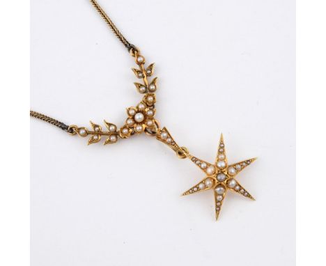 A VICTORIAN PEARL NECKLACE. the foliate pearl set necklace suspends a pearl set star pendant, on a gold chain, 38cm long.  **