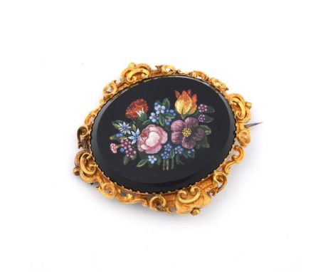 A VICTORIAN MICROMOSAIC BROOCH. oval, of foliate form, mounted in an ornate gold mount, 5 x 6cm.  **BP 22.5% inc VAT + Lot Fe