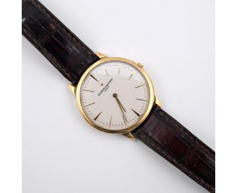 A GENTLEMAN'S 18CT GOLD WRISTWATCH BY VACHERON CONSTANTIN. the signed circular dial with baton and dagger numerals, numbered 