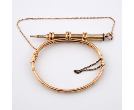 A GOLD PROPELLING PENCIL ON A GOLD HALF HINGED BANGLE BY S. MORDAN &amp; CO. internal measurements 6 x 4.5cm., 21.2 grams.  *