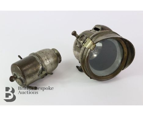 Pre-war Miller motorbike headlamp together with a Joseph Lucas no 31 lamp acetylene carbide generator.&nbsp;
&nbsp;
