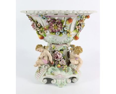 Continental table centrepiece, porcelain fruit bowl, profusely decorated with flowers, berries, fruit and putti in relief, ap