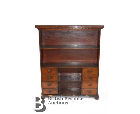 Mahogany shelf unit, with four drawers to either side, approx 95 x 155 w x 25d, supported on bracket feet.