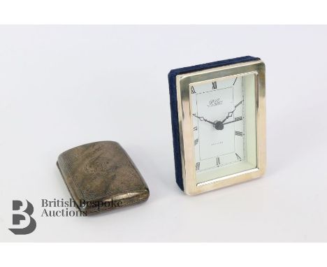 Robert Carr silver alarm clock, Sheffield 1995 mm RC, together with a silver cigarette case, Chester 1898 mm W.M (William Nea