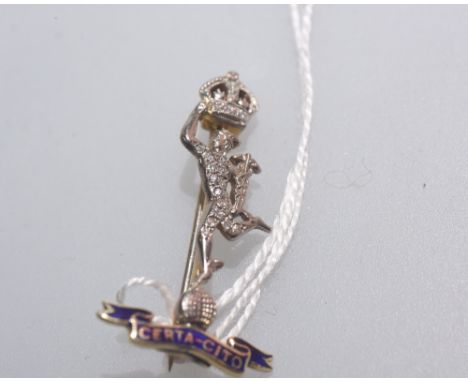A Royal Corps of Signals 14ct gold and platinum brooch, with blue enamel swag and motto 'Certa-Cito', stamped marks to revers