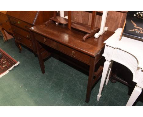 An early 20th century oak sofa table