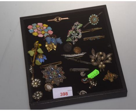 A collection of Edwardian and mid 20th Century costume jewellery including a pair of paste cluster clips, a turquoise bead an