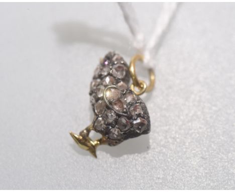 An early 20th century pendant in the form of a chick, mounted with diamonds and with a small ruby mounted in the eye. 10mm