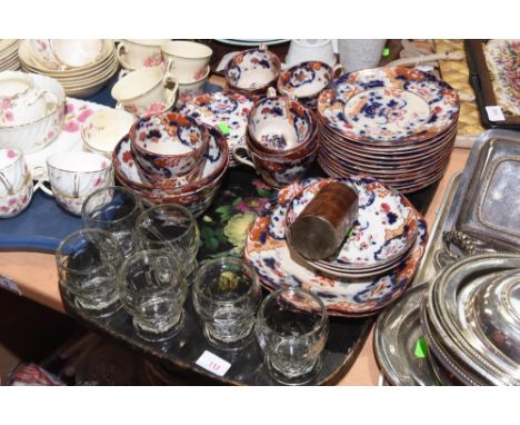 A tray inc. a mid 19th century Ironstone china tea service comprising twelve plates, 9 various sized  cups, three large sauce