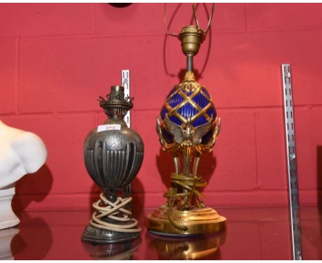 A Walker &amp; Hall silver plated table lamp and a Russian Empire style gilt and blue lamp (2) 