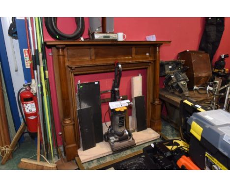 An Edwardian mahogany fire surround with marble hearth and brass fender