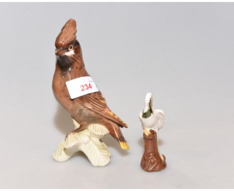 A Goebel china model of a crested waxwing, circa 1960,  together with a Continental model of a crane (2)