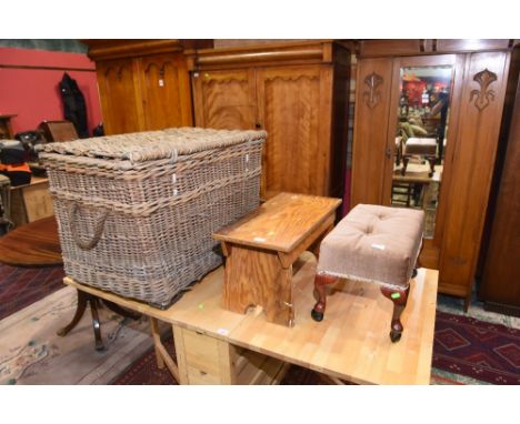 A substantial wicker hamper; tog. with two stools (3)