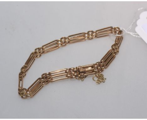 A 15ct gold gate link bracelet, stamped marks to clasp, 10.5 grams