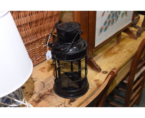 A black painted lantern