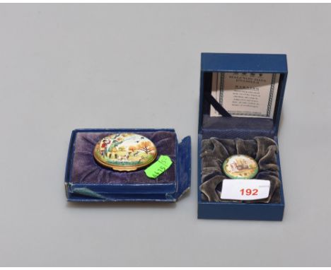 Two Halcyon Days enamel trinket boxes, one with a hunting scene. 
