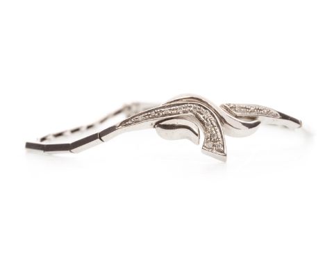 DIAMOND SET BRACELET formed by a central ornate panel with grain set round diamonds, with plain links behind, unmarked, 9.7g