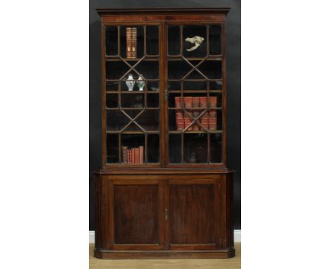 A 19th century mahogany library bookcase, outswept cornice with meandrous border above a pair of astragal glazed doors enclos