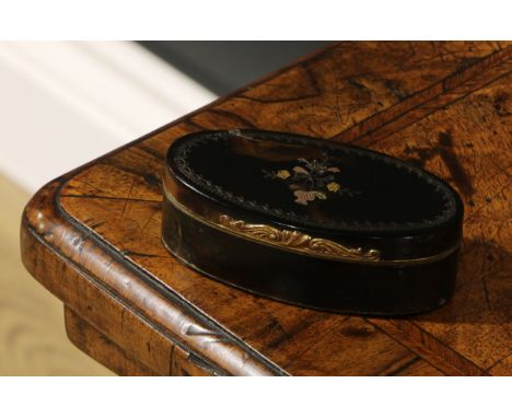 A George III tortoise shell oval snuff box and cover, inlaid with rose and yellow gold, 7.5cm wide, c.1800 