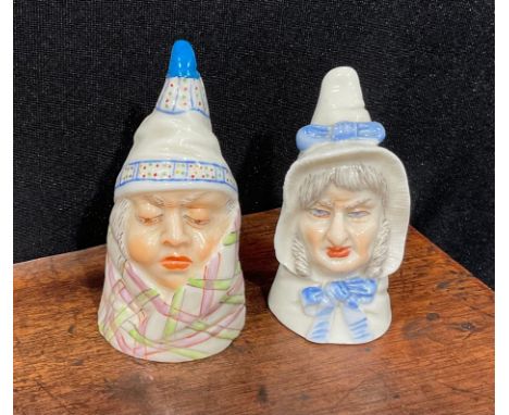 A Royal Worcester candlesnuffer, Mr Caudle, wearing a night cap and blanket, lightly coloured, 8cm high, printed crown and ci