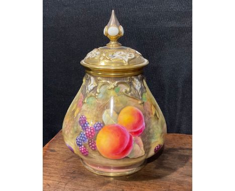 A Royal Worcester lobed ovoid pot pourri vase and pierced cover, painted by J Skerrett, signed with peaches grapes and blackb