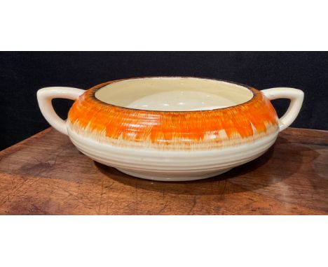 A Clarice Cliff Bizarre Rodanthe pattern compressed circular ribbed two handled bowl, 25cm across handles, printed Wilkinson 