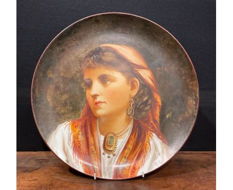 The Howell &amp; James Art Pottery Exhibition - an Aesthetic Movement circular charger, painted by Miss Mabel Saunders, monog